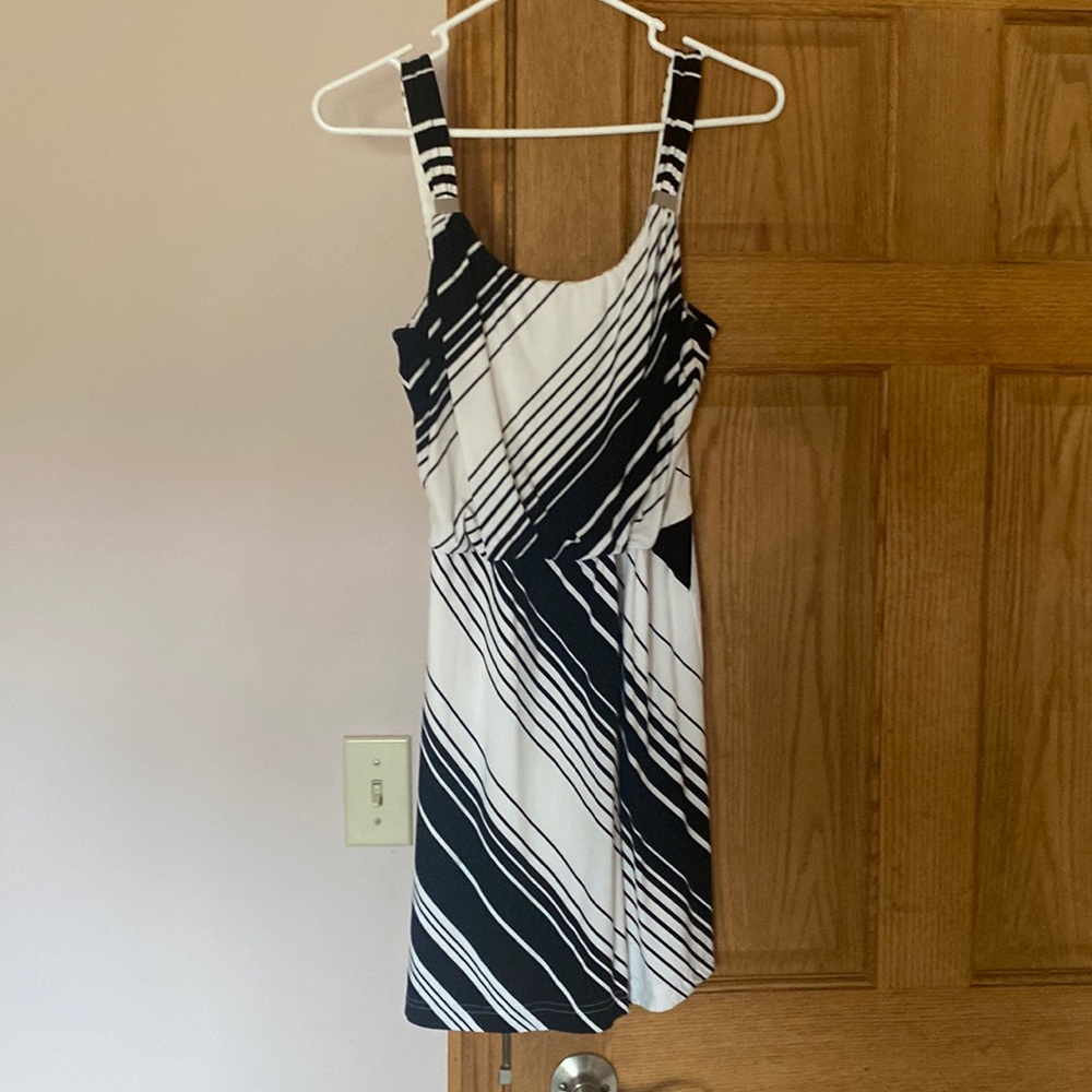 White House/Black Market size Small dress in black and white with white liner.
